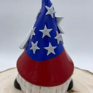 Birthday Gnome for the month of July wearing Red, White, and Blue hat, with silver stars, Back