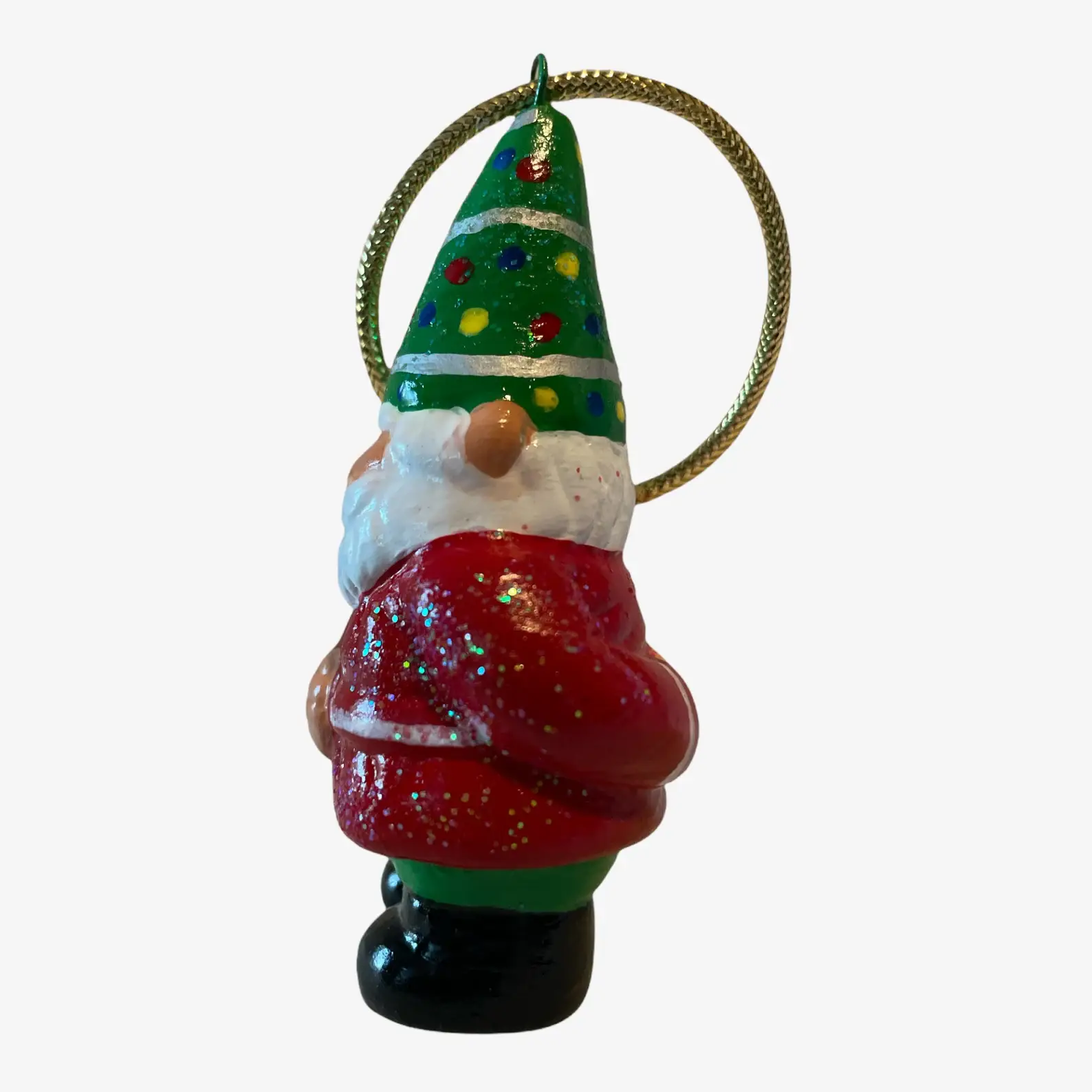 Gnome Christmas Ornament with gold hanging cord, Red Coat, Green Pants, and Green Hat decorated like a Christmas tree, left